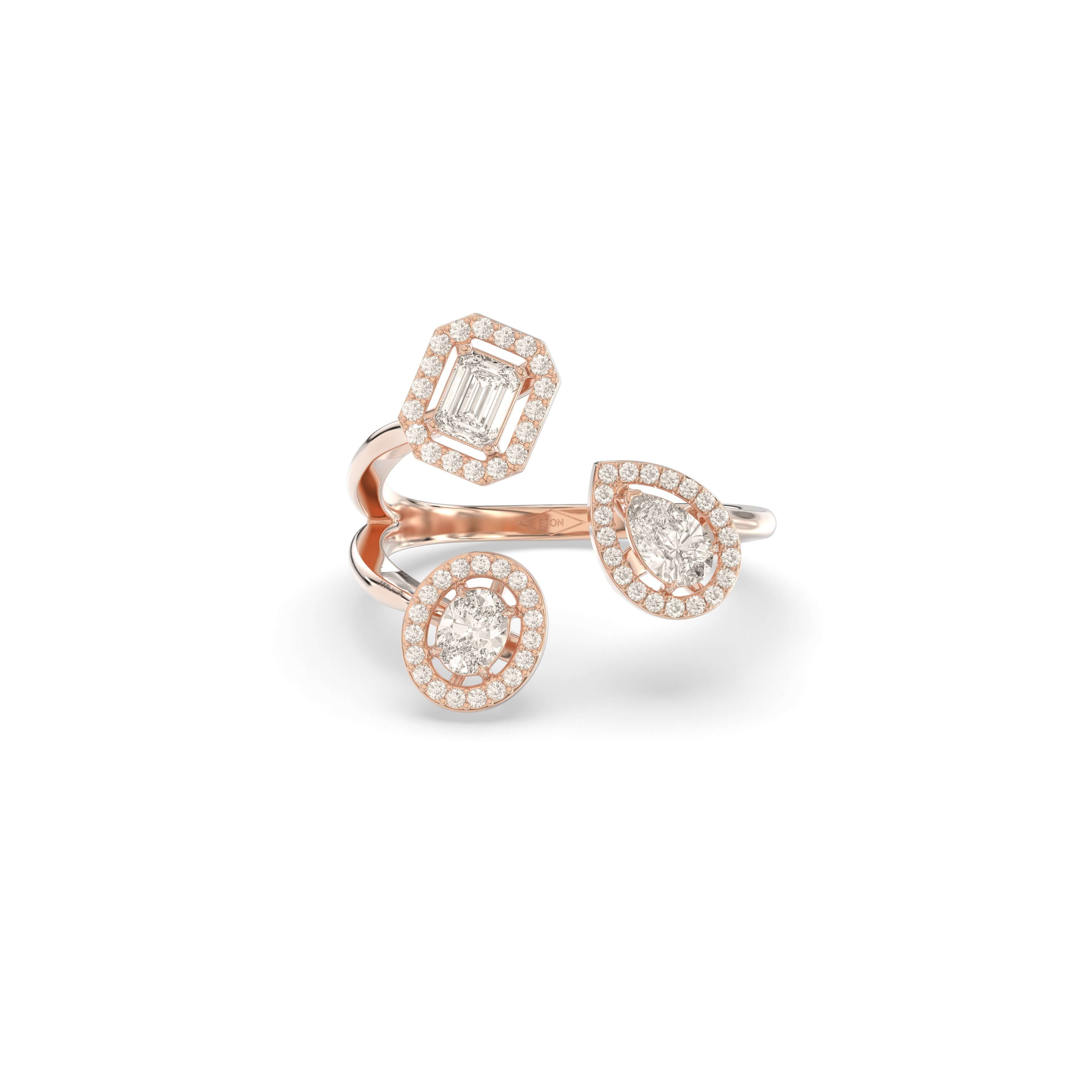 Evolved Trio Halo Ring featuring emerald, oval, and pear-shaped lab-grown diamonds with pavé halos.